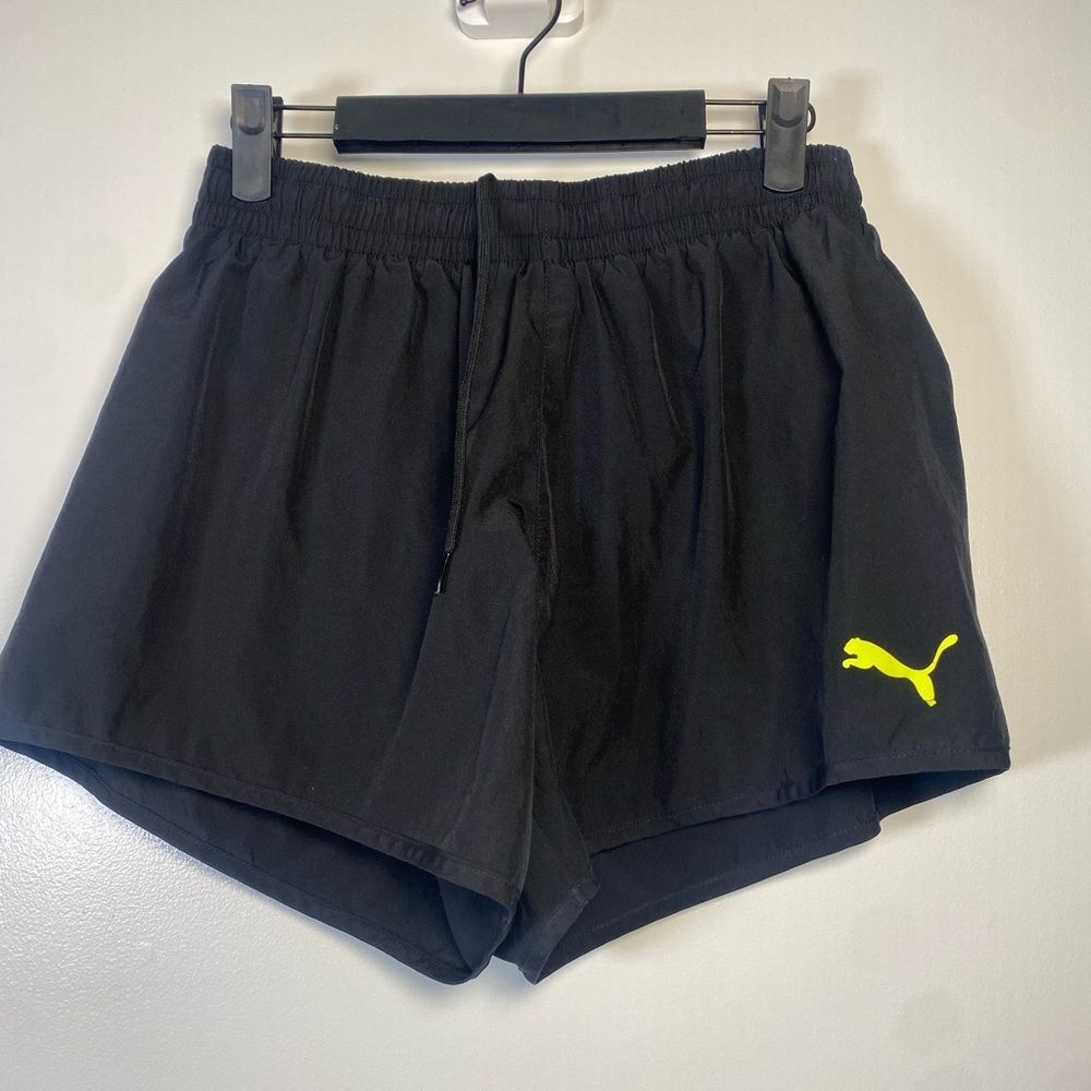Puma Women's Black Athletic Shorts with Yellow Logo